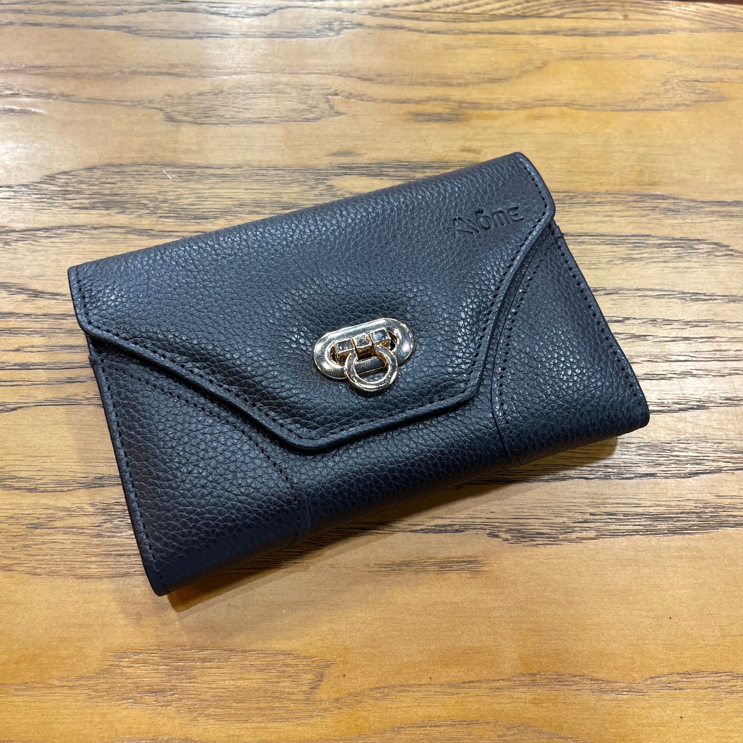 PORTEFEUILLE EN CUIR NOIR 2357