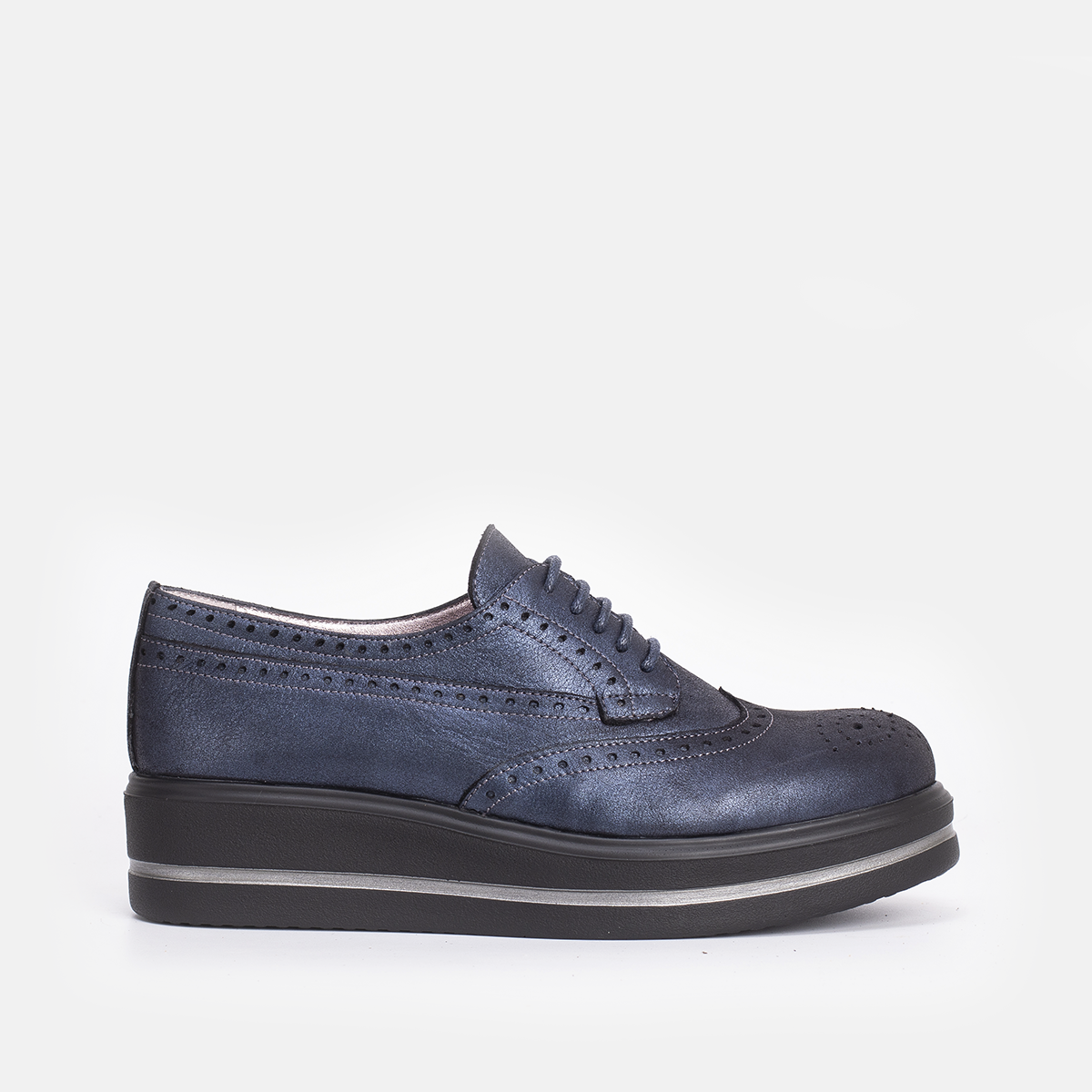 PINAR EN CUIR taché bleu