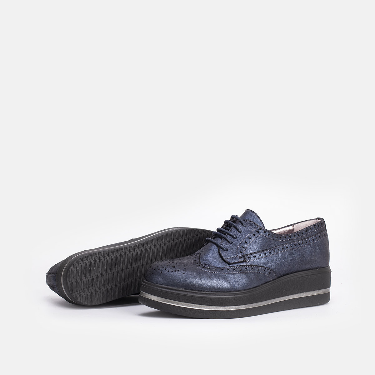 PINAR EN CUIR taché bleu