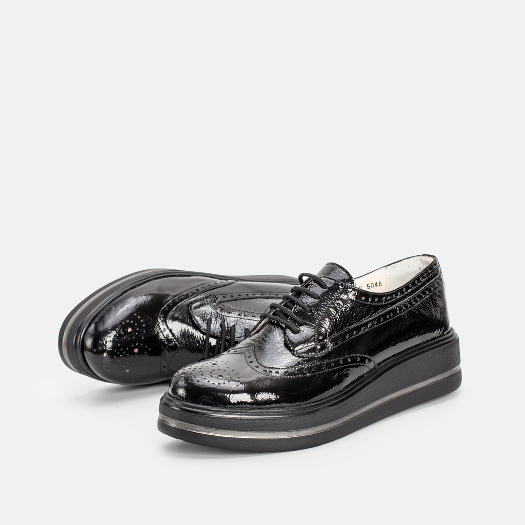 PINAR EN CUIR BRILLANT NOIR