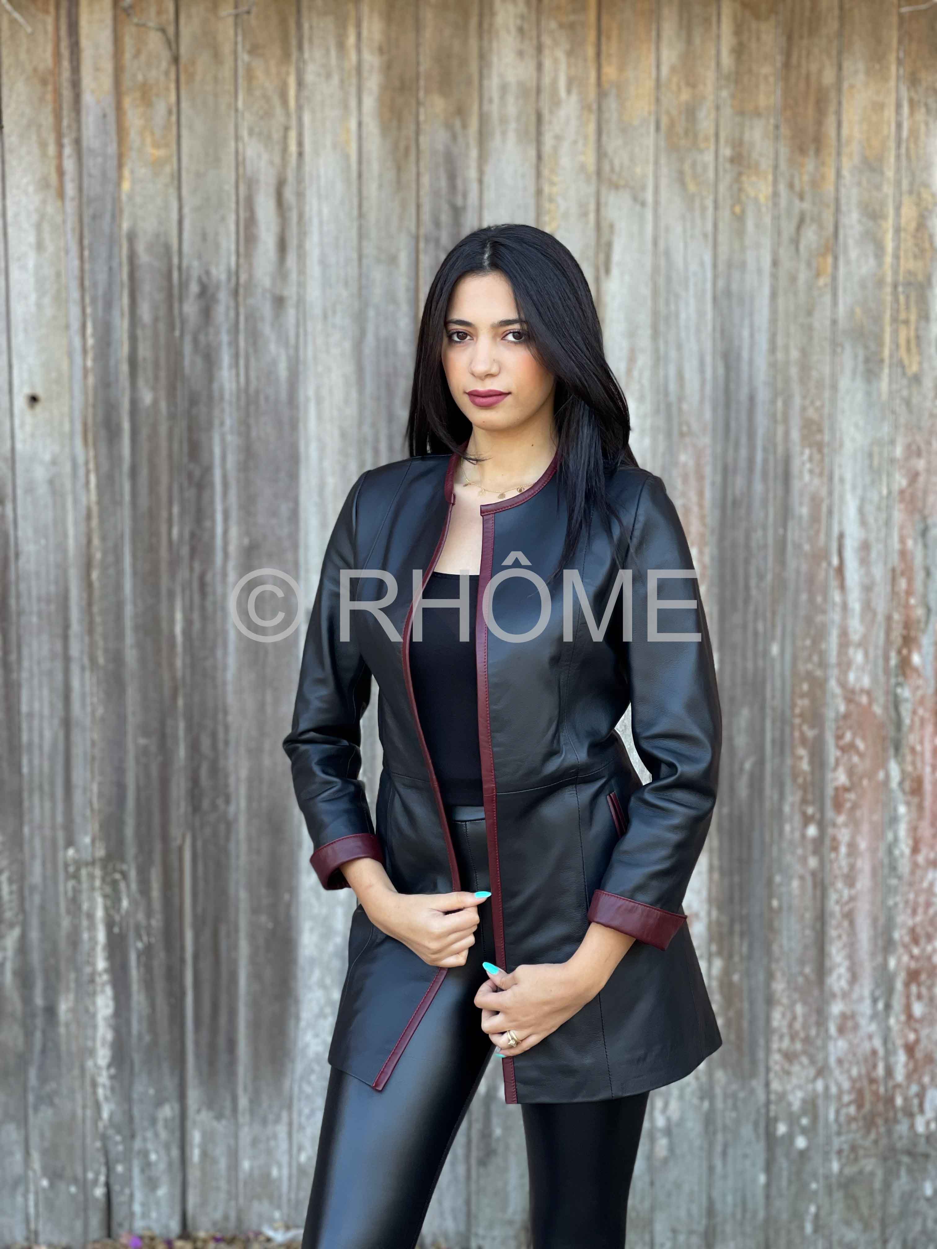 Manteau en cuir noir avec bordure contrastante